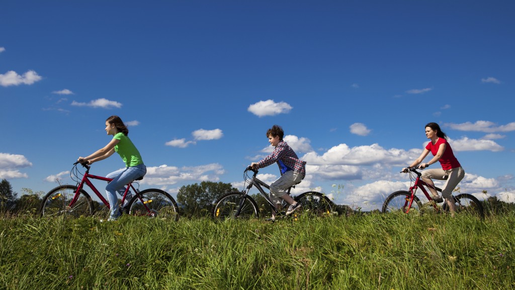 family riding bikes