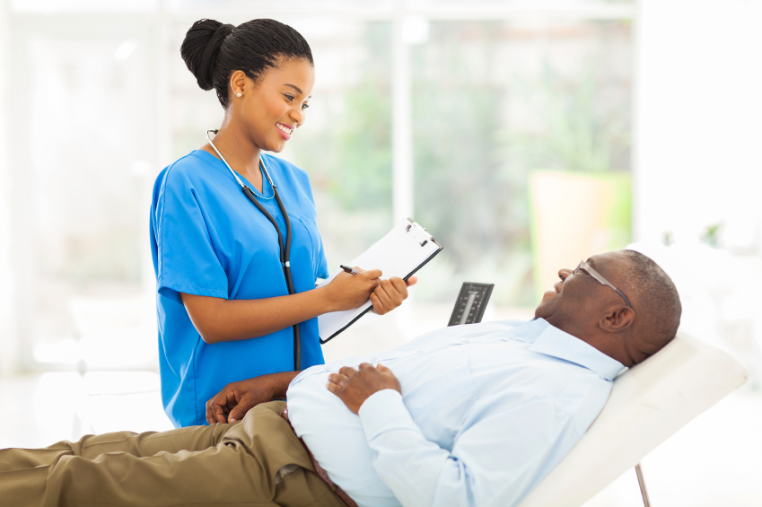 african female doctor consulting senior patient
