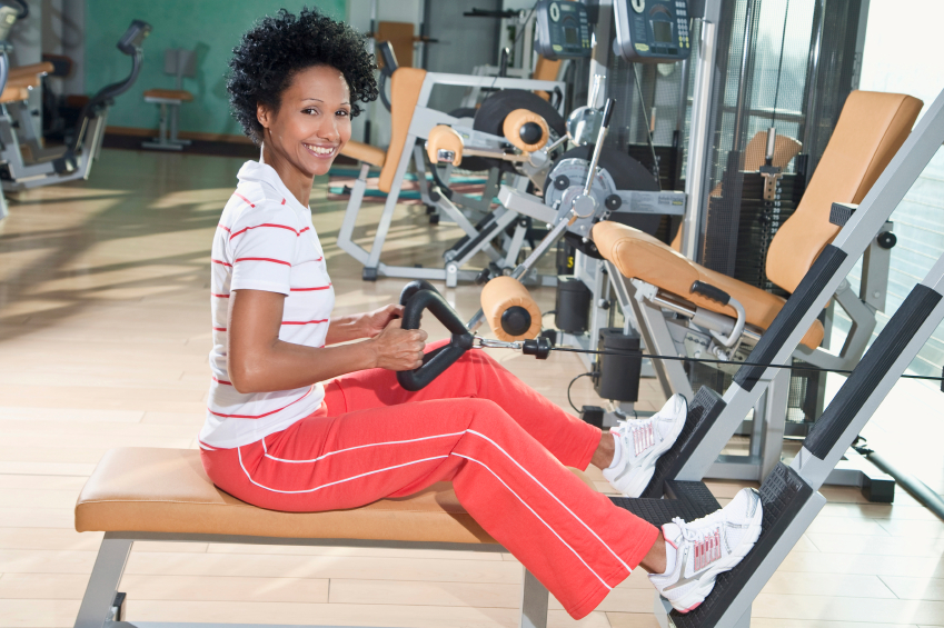 Germany, Bavaria, Woman exercising in gym, portrait